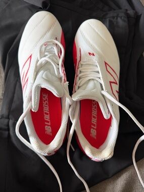New Balance White & Red Lacrosse Shoes